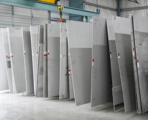 Metal Plates Lined Up Next to Each Other