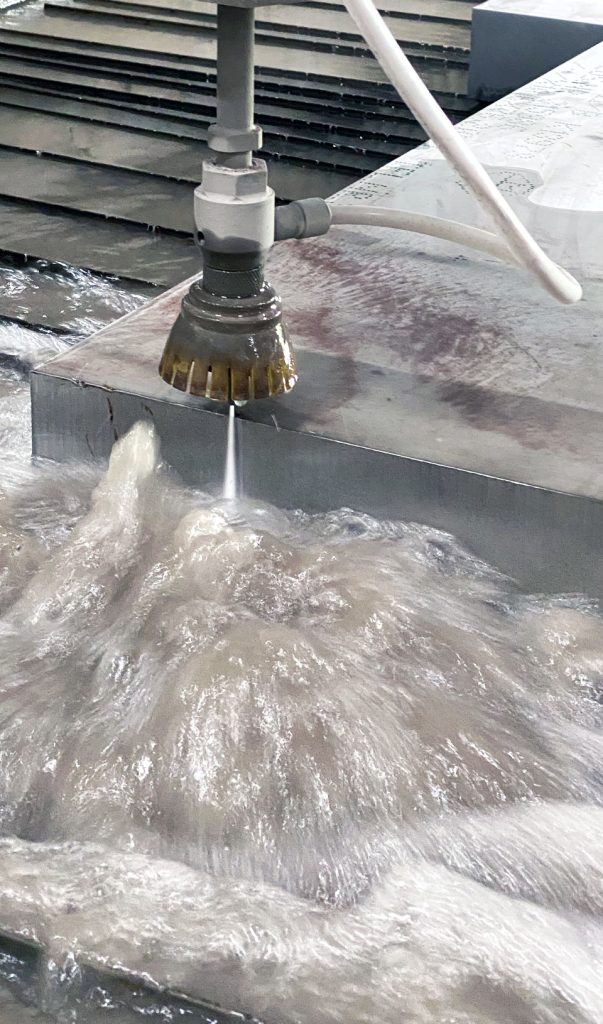 Water jet cutting of stainless steel plate